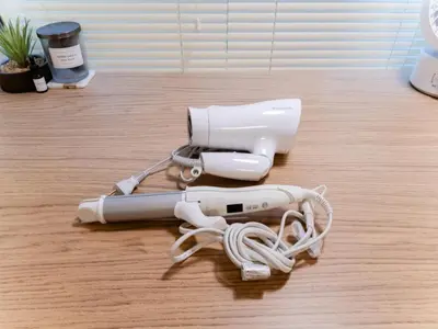 a hair dryer sitting on a wooden floor at Shinjuku,Ushigome Yanagicho Sta 1min walk , Kabukicho3min in Tokyo