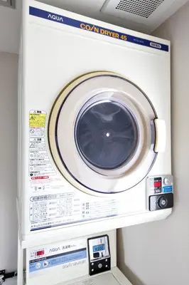 a washing machine is hanging on a wall at smart room tokyo koiwa city in Tokyo