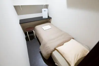 a small room with a small bed in a room at smart room tokyo koiwa city in Tokyo