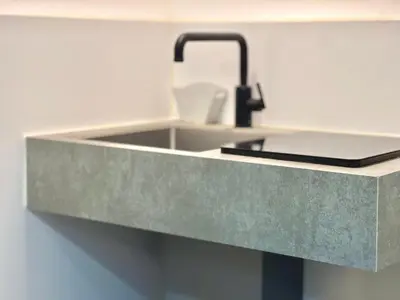 a kitchen counter with a sink and aaucet at Aizumi Hostel-SJ0193 in Tokyo