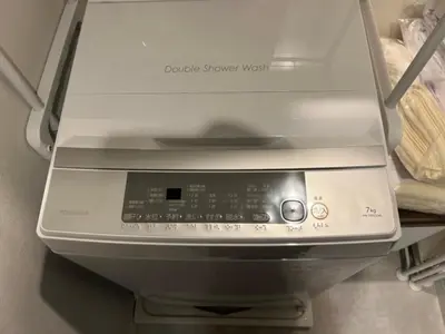a machine is sitting on a shelf at Aizumi Hostel-SJ0193 in Tokyo
