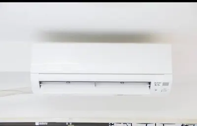 a computer monitor sitting on top of a desk at Momo palace in Tokyo