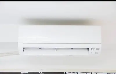 a computer monitor sitting on top of a desk at Ikebukuro Florence Hostel in Tokyo