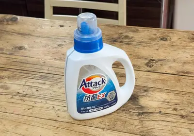 a bottle of ant spray sitting on a wooden table at Good Space Hotel Yoyogi in Tokyo