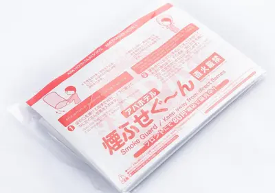 a plastic package with red writing on it at APA Hotel Kanda Jimbocho Ekihigashi in Tokyo