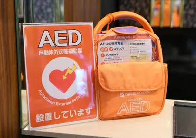 a bag of acid sitting on a table next to a bag ofadobeadobeadobe at APA Hotel Kanda Jimbocho Ekihigashi in Tokyo