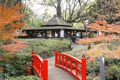 a red gate leading to a gazebo in a park at Hotel New Otani Tokyo Garden Tower in Tokyo