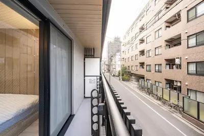 a balcony with a view of a street at BO402 \u30ab\u30c3\u30d7\u30eb\u306b\u6700\u9069 \u6d45\u8349\u5bfa\u305d\u3070 \u65e5\u672c\u4ebaSuperHost in Tokyo