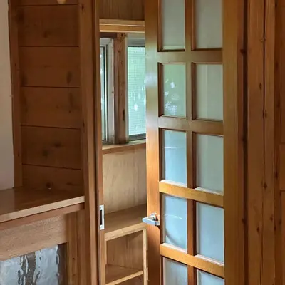 a pair of glass doors in a room at \u795e\u697d\u5742\u6238\u5efa\u3066\u30b5\u30a6\u30b9 in Tokyo