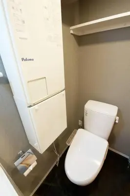 a bathroom with a white toilet in a room at Musashi's hotel IKEBUKURO2F in Tokyo