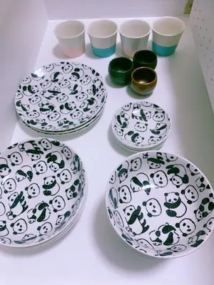 a group of plates and bowls on a table at miki II in Tokyo