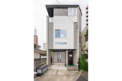 a view of a house from the street at Ikebukuro Shopping Street 3BR in Tokyo