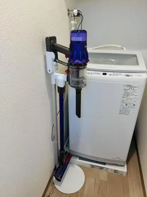a water gun sitting on top of a machine at \u685cHome in Tokyo
