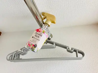 a bottle of essential oils hanging from a ceiling at \u685cHome in Tokyo