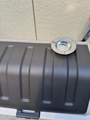 a suitcase with a wheel on top of it at \u685cHome in Tokyo