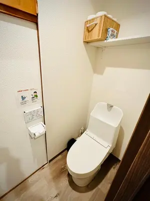 a bathroom with a white toilet in a room at \u685cHome in Tokyo