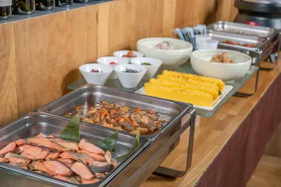 a buffet with many different types of food on a table at Hotel Mystays Gotanda Station in Tokyo