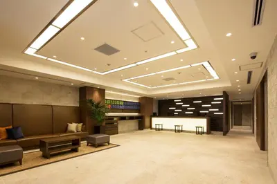 a lobby with a skylight in a building at Hotel Mystays Gotanda Station in Tokyo