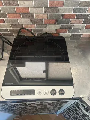 a toaster oven sitting on top of a counter at Local Stay NAKAI in Tokyo
