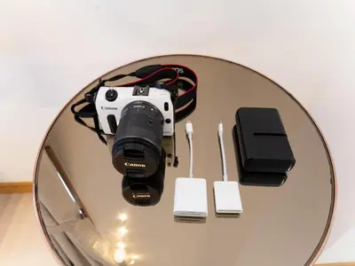 a camera sitting on top of a glass table at Shinjuku, Hatsudai Sta 7min walk,PS5,Switch,Wi-Fi in Tokyo
