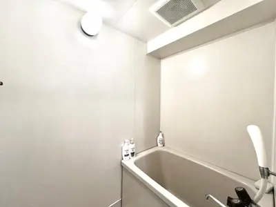 a bathroom with a bath tub and a sink at AX-Ikebukuro 601-TS0177 in Tokyo