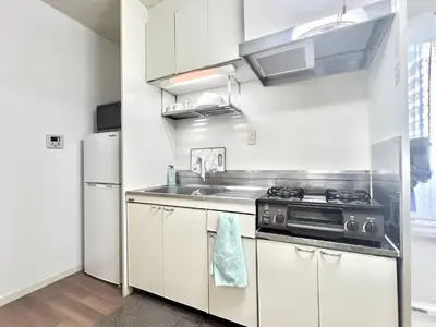 a kitchen with a sink and a refrigerator at AX-Ikebukuro 601-TS0177 in Tokyo
