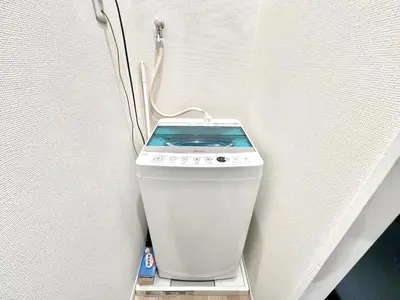 a white toilet sitting on a shelf in a wall at AX-Ojima House-KT0175 in Tokyo