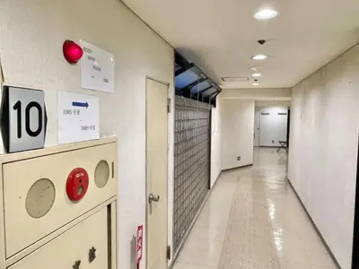 an empty hallway of a hospital with a hallway at Dainess Ichibankan Shibuya in Tokyo