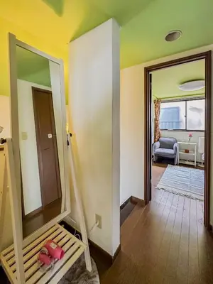 a hallway with a room with a mirror and a living room at Tranquil Tokyo Retreat #Spacious 3BR House in Hiroo in Tokyo