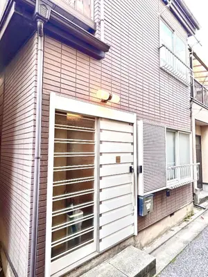 a building with a large door on the side of it at Shinkoiwa Stay, Private House, Nearby Station, Good access to Ueno&Asakusa in Tokyo