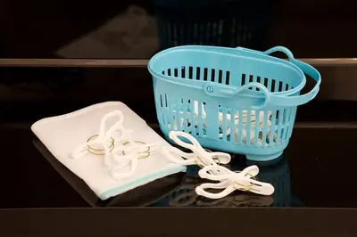 a blue basket and a pair of socks and a pair of scissors at \u30bb\u30f3\u30c8\u30ec\u30a4\u62bc\u4e0a\u30ce\u30fc\u30b9 205 in Tokyo