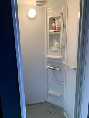 a refrigerator with its door open in a room at The Standard Apartment SHIBUYA SASAZUKA Room K in Tokyo