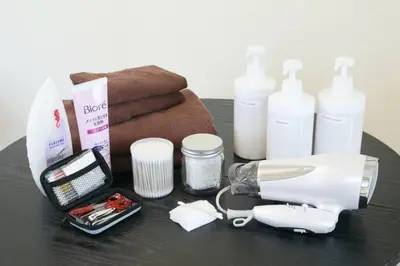 a table with a hair dryer and other products on it at \u30b5\u30f3\u30cf\u30a4\u30c4\u521d\u53f0 201 in Tokyo
