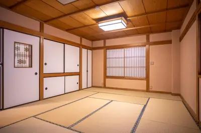 an empty room with a door and a window at Miyabi Inn-Kameido in Tokyo