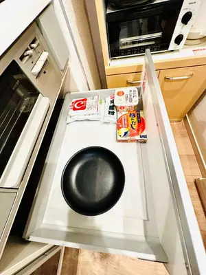 a kitchen with a black bowl on the counter at MoRi House IN西日暮里Ⅱ in Tokyo