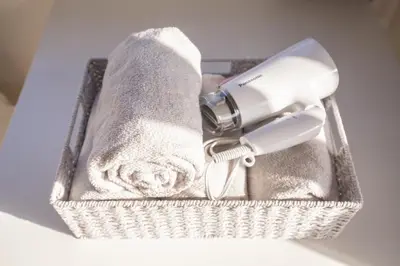 a hair dryer and a blow dryer in a basket at walk to Ushigome-yanagicho sta. EoWh in Tokyo