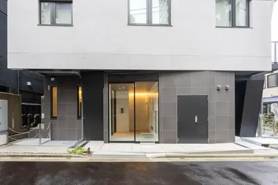 a building that is under construction with its doors open at Sun Place \u795e\u697d\u5742 in Tokyo