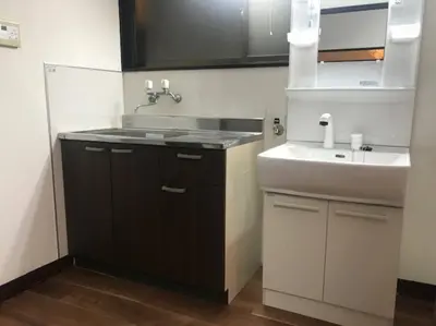 a bathroom with a sink and a white sink at RIKASOU#101 in Tokyo