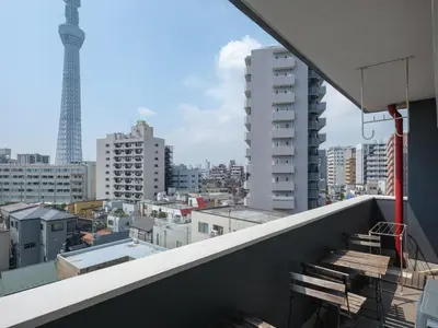 a balcony with a view of a city at Grace Mukojima 701 in Tokyo