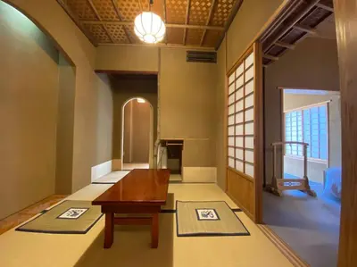a room with a table in the middle of a room at SHINJUKU Luxury MIYABI Huge 150m2 Penthouse 3 Levels Max 12PPL in Tokyo