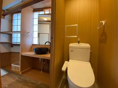 a bathroom with a white toilet and a sink at SHINJUKU Luxury MIYABI Huge 150m2 Penthouse 3 Levels Max 12PPL in Tokyo