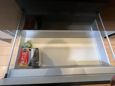 an empty refrigerator with food and drinks in it at Saitore in Tokyo