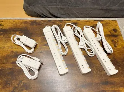 a group of nintendo wii controllers sitting on a table at LVB Shinjuku in Tokyo