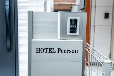 a ticket machine in front of a hotel room at HOTEL Peerson - Vacation STAY 73421v in Tokyo