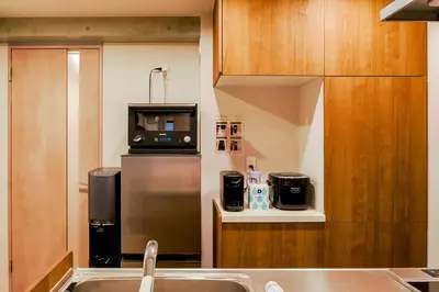 a kitchen with a sink and a refrigerator at Seirai Asakusa Vacation Rental - Vacation STAY 81010v in Tokyo