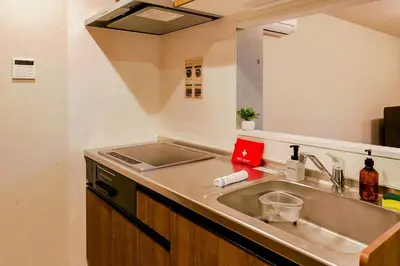 a kitchen with a sink and a counter top at Seirai Asakusa Vacation Rental - Vacation STAY 81001v in Tokyo