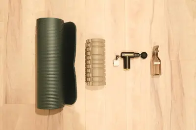 a green tube on a wooden floor next to a bottle at Seirai Asakusa Vacation Rental - Vacation STAY 81001v in Tokyo