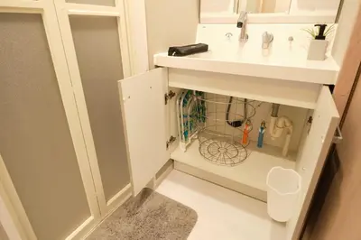 a bathroom with a white cabinet with a sink at Seirai Asakusa Vacation Rental - Vacation STAY 81015v in Tokyo