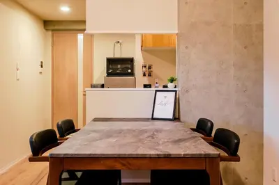 a dining room with a table and chairs at Seirai Asakusa Vacation Rental - Vacation STAY 80997v in Tokyo