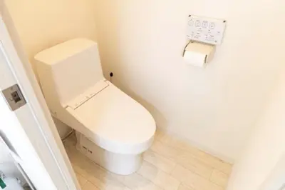 a bathroom with a white toilet in a room at Masaya setagaya in Tokyo